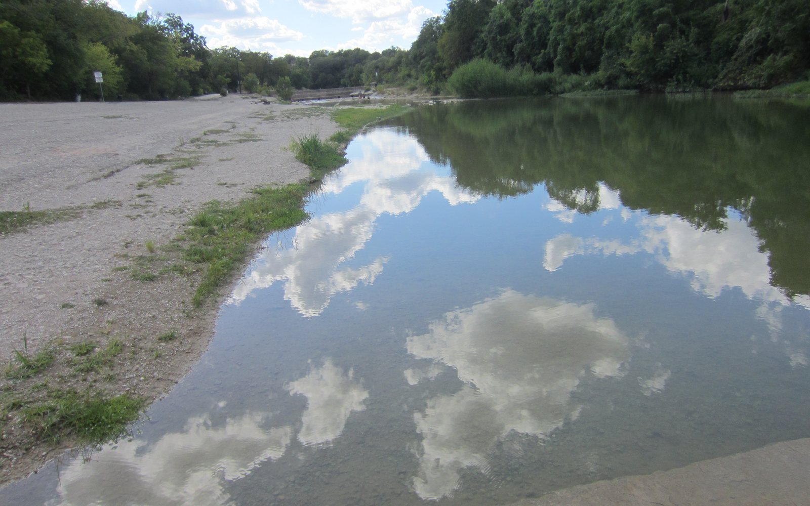The San Gabriel River reflecting the sky in Georgetown