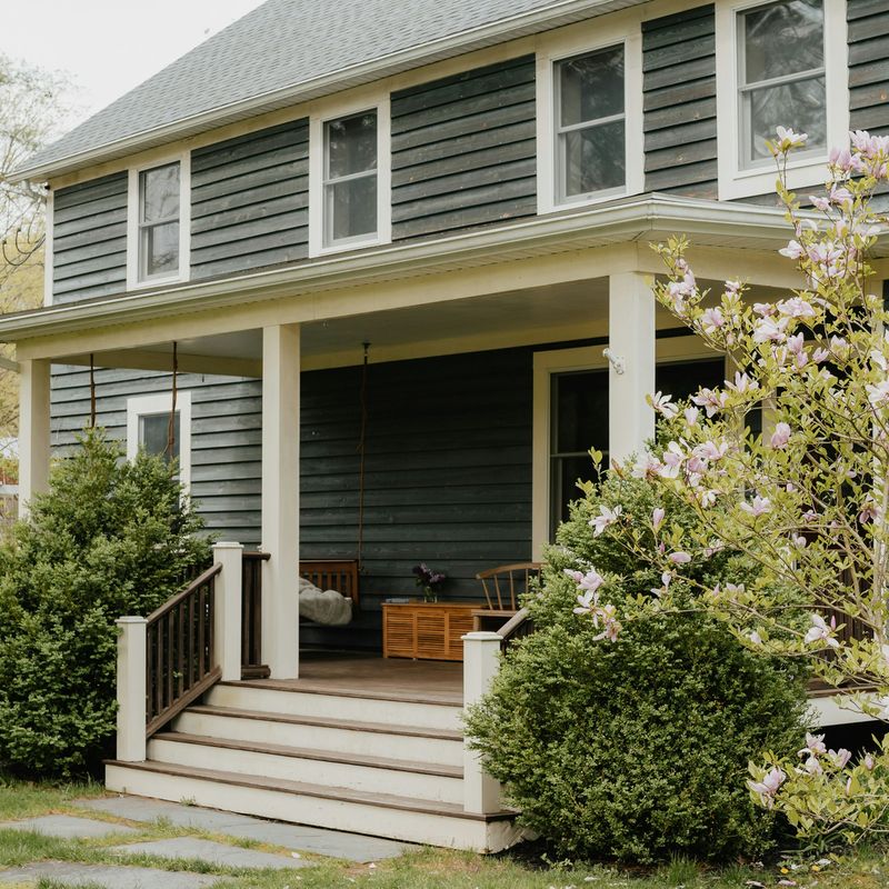 A covered front porch and steps